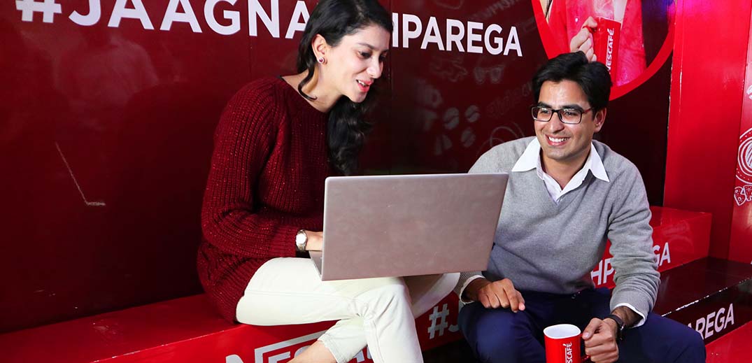 marketing-woman-man-office-discussion-wide